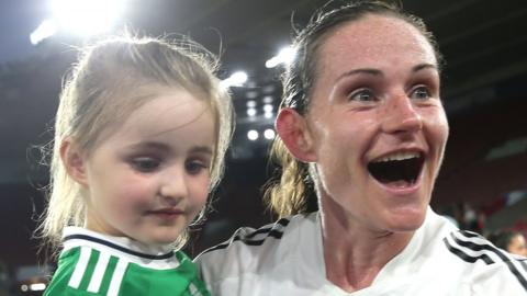 Sarah McFadden with her daughter Harper after the Euro 2022 opener against Norway at Southampton in July