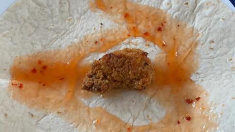 Picture of solitary chicken goujon in wrap
