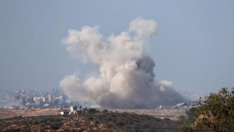 Smoke rises following an Israeli airstrike on Beit Hanoun in northern Gaza, as seen from Sderot, Israel, 01 December 2023