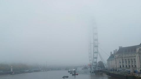 London eye in fog