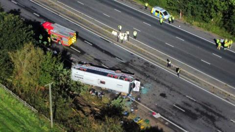 Emergency services at the scene of a coach crash