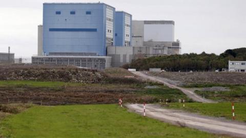 A road cuts through the site where EDF Energy"s Hinkley Point C nuclear power station will be constructed