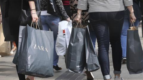 Shoppers carrying shopping bags