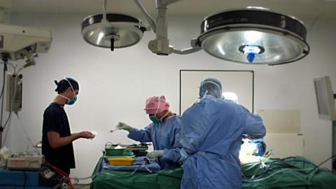 File photo of a surgeon in an operating room