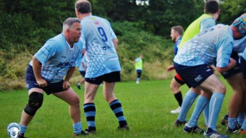 Gareth Davies (far left) playing rugby for Cardiff Chiefs