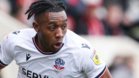 Dan Nlundulu in action for Bolton