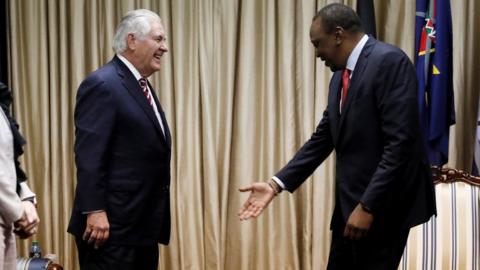 Kenya's President Uhuru Kenyatta (R) greets U.S. Secretary of State Rex Tillerson and his delegation prior to a meeting at the State House in Nairobi, on 9 March 2018