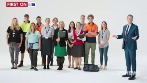 An image from the advert showing Labor leader Bill Shorten and a group of people, a majority of whom are white