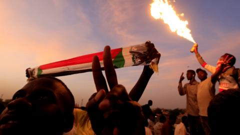 Sudanese demonstrators attend a sit-in outside the defence ministry in Khartoum, Sudan April 14, 2019