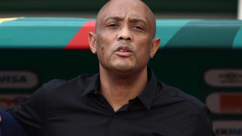 Comoros coach Amir Abdou in the dugout