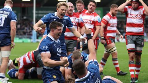 Ben Curry celebrates as Tommy Taylor scores Sale's second try