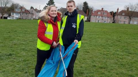 Jac Danielle litter picking with her brother