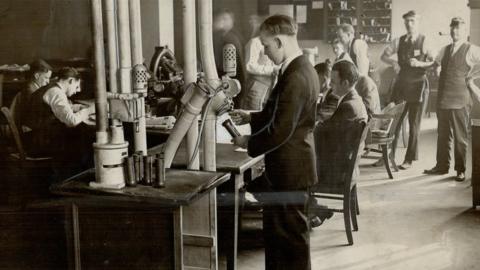 Man using a pneumatic tube