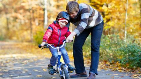 Kid on bike