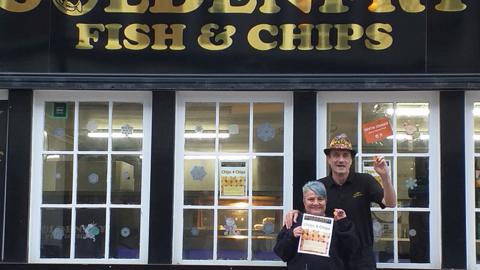 Michelle and John Rennison outside their shop