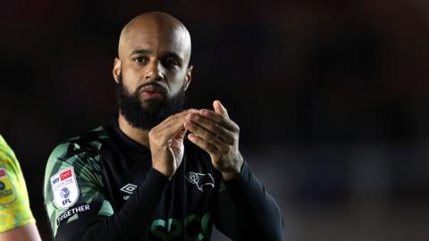 David McGoldrick claps Derby fans after their win against Exeter