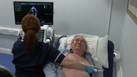 Patient Roger Nicholson and the new Echo machine