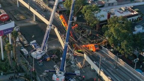 An aerial view shows the site of a metro train accident after an overpass for a metro partially collapsed in Mexico City