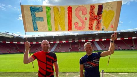 Chris Scott and Shaun Spence at the finish line