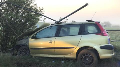 Car down a ditch