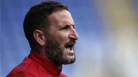 Martin Paterson calls instructions to Swansea players from the side of the pitch