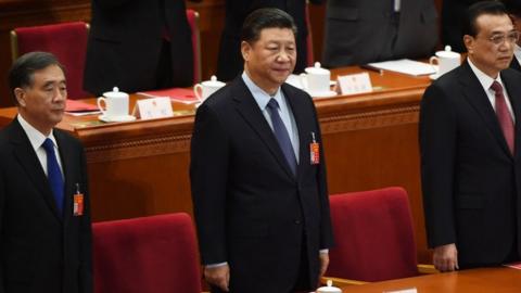 China's President Xi Jinping in the centre, Premier Li Keqiang second right, Chairman of the National Committee of the Chinese People's Political Consultative Conference Wang Yang left and Politburo Standing Committee member Wang Huning on the right