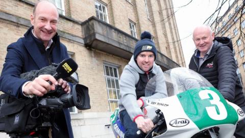 ý Sport NI's Stephen Watson with record race winner Alastair Seeley and the NW200's Mervyn Whyte