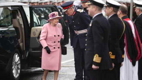 The Queen next to HMS Ocean