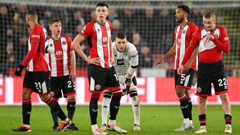 Sheffield United players looking dejected