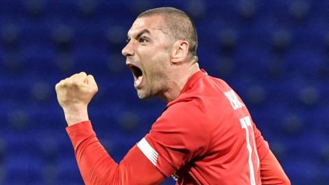 Burak Yilmaz celebrates scoring