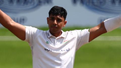 Rishi Patel celebrates a century for Leicestershire