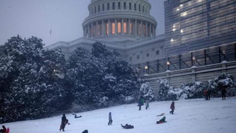 People sledging on Capitol Hill in Washington