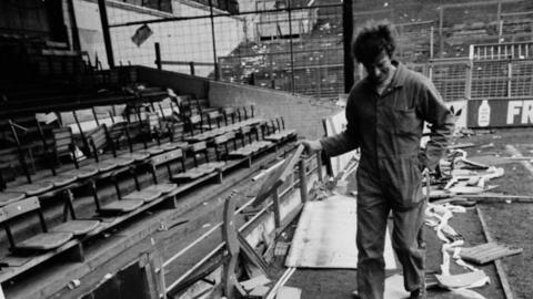 Damaged seats and rubble at Kenilworth Road football ground after a riot in 1985.