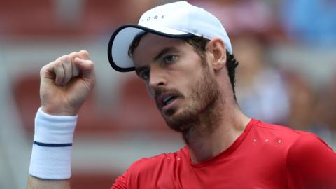 Britain's Andy Murray raises his fist in celebration after beating Cameron Norrie in round two of the China Open