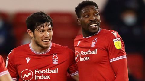 Scott McKenna and Sammy Ameobi celebrate a goal against Millwall