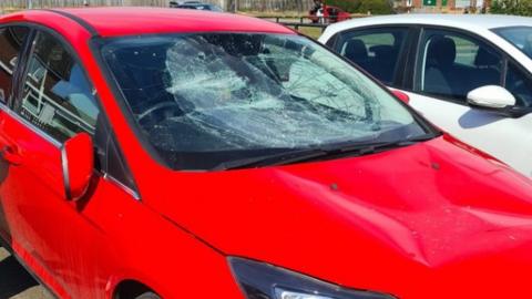 The damaged car windscreen
