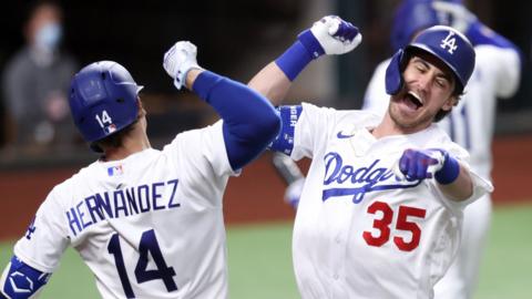 Cody Bellinger and Enrique Hernandez celebrate