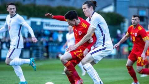 Aeron Edwards in action against England C in 2022.