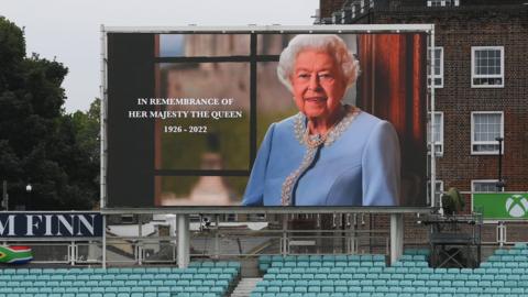 A board paying tribute to Queen Elizabeth II following her death at the Kia Oval cricket ground