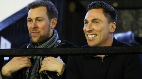 Scott Brown and assistant Steve Whittaker, left, watch their new team secure victory