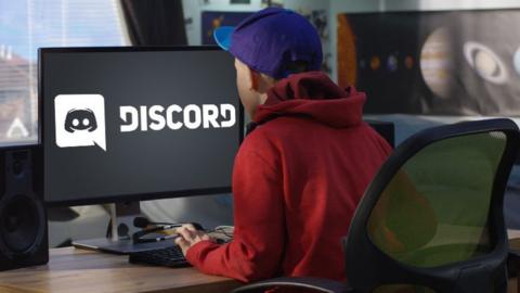 A child looks at a screen on to which has the Discord logo composited on to it