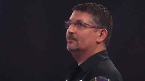 Scotland's Gary Anderson looks on during his third-round match against Madars Razma at the PDC World Championship