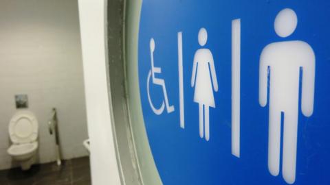 Disabled, female and male toilet symbols