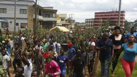 Demonstrators march during a protest against perceived discrimination in favour of the country's Francophone majority on September 22, 2017 in Bamenda, north-west Cameroon