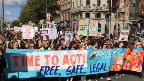 People marching through Dublin