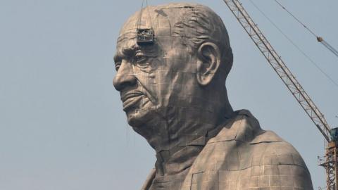 Indian workers give the finishing touches to the world's tallest statue dedicated to Indian independence leader Sardar Vallabhbhai Patel in India's western Gujarat state.