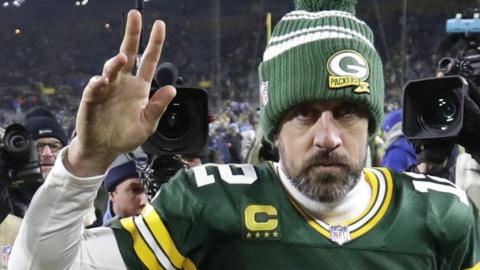 Quarterback Aaron Rodgers waves to fans as he leaves the field after the Green Bay Packers' loss to the Detroit Lions in January 2023