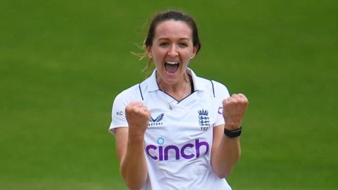 Kate Cross celebrates a wicket for England