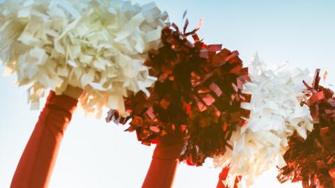 Cheerleaders' pom poms