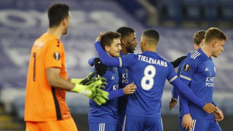 Leicester City's players celebrate scoring against AEK Athens in the Europa League